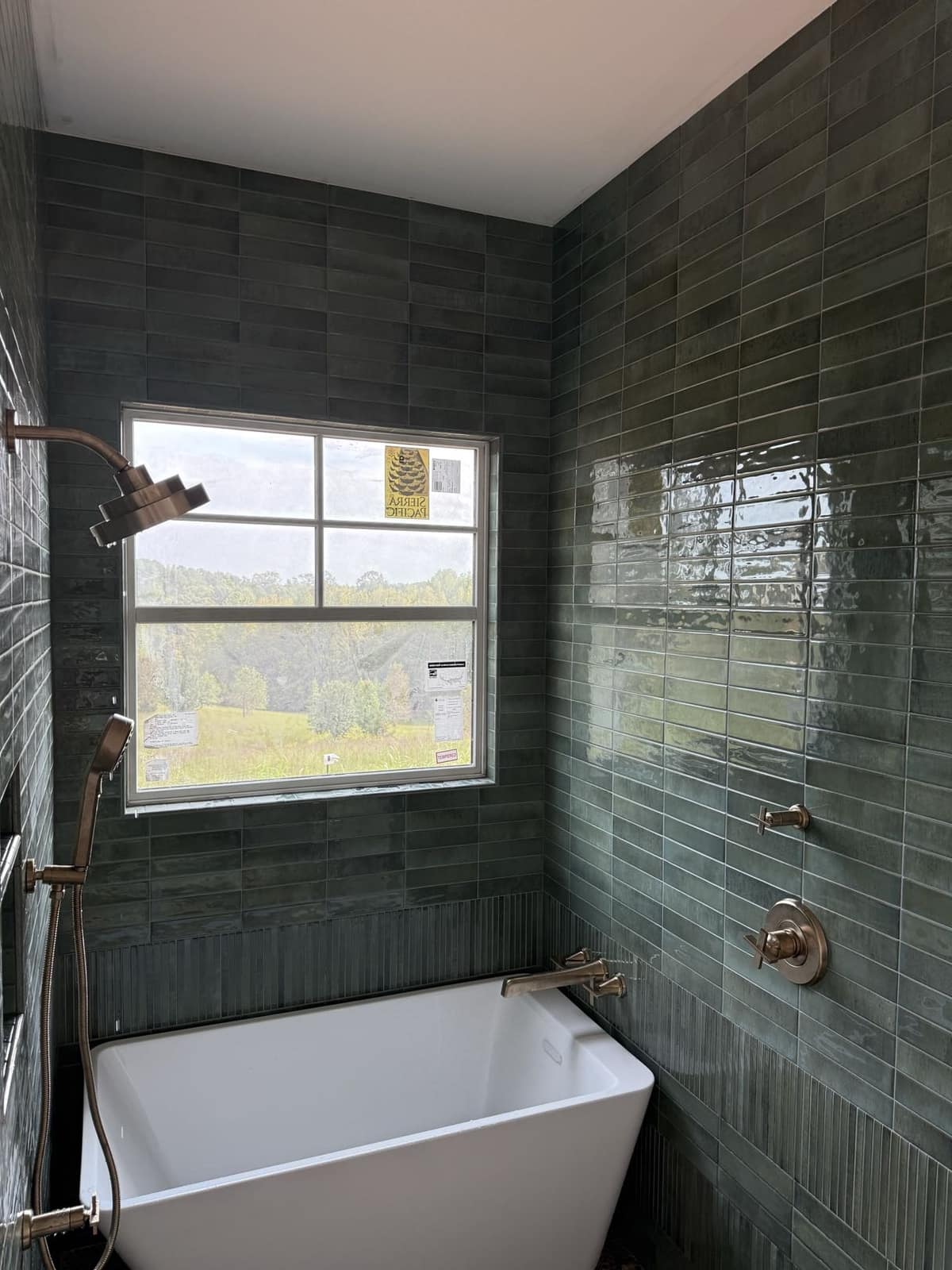 Professional plumber repairing a shower in a Greenville SC home